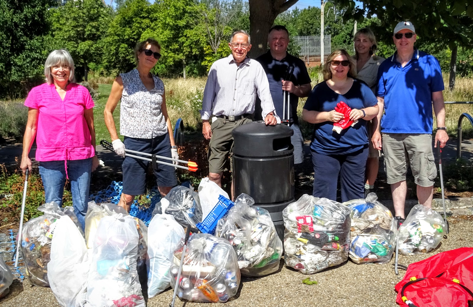 Group photo of smiling litter pickers