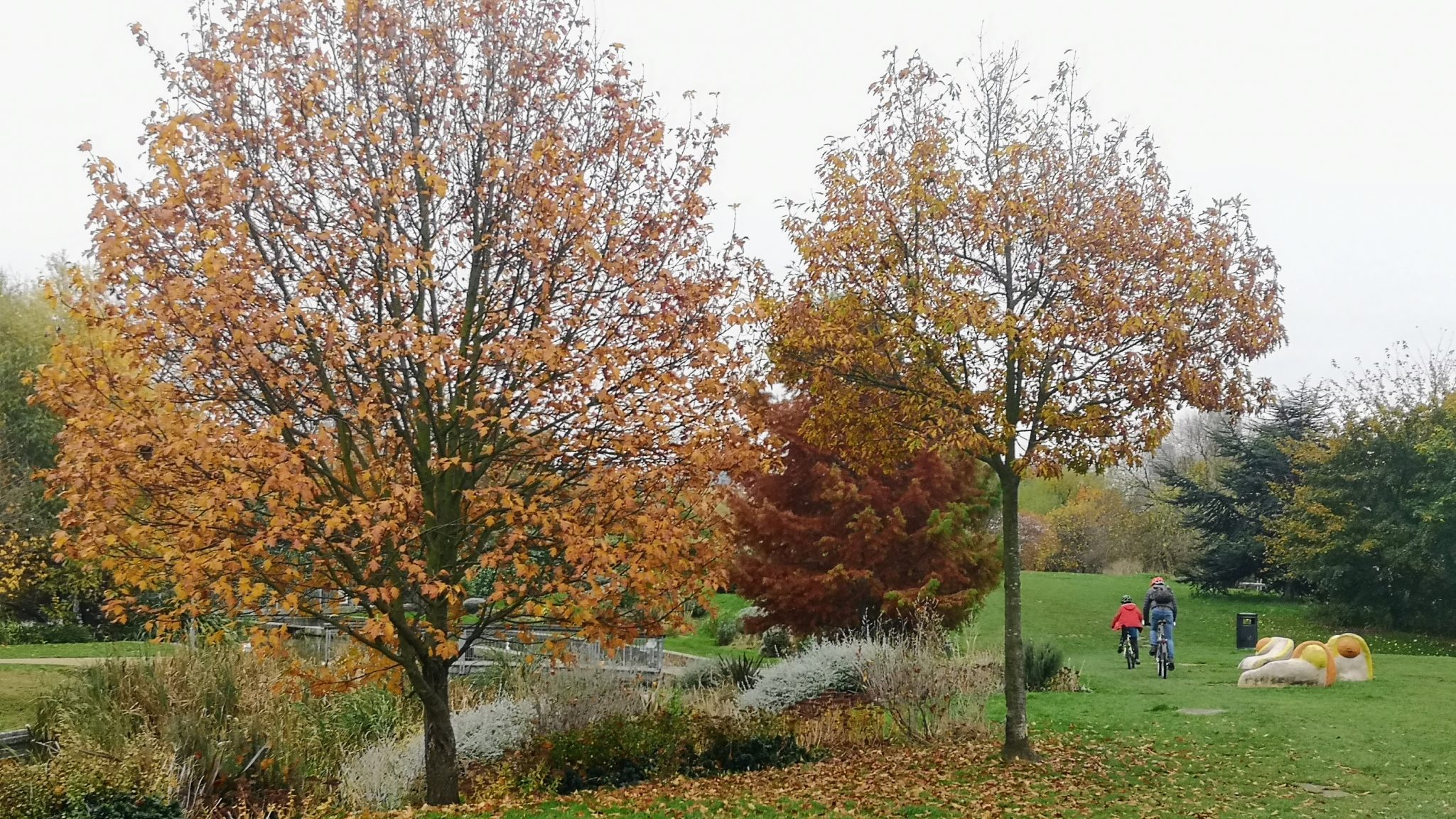 Bikes riding through Mile End Park's Art Park